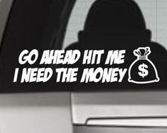 a sticker that says go ahead hit me i need the money