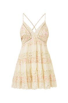 Put on the pretty in the Posie Dress. This stunning mini dress arrives with ditsy floral print mixed with a solid habotai fabric blended with intricate laces. The strappy mini features mixed fabric criss cross straps, and an empire waist that releases into a beautiful skirt detailed with solid pieces and laces.