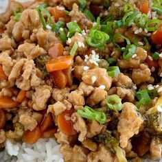 a white bowl filled with rice and vegetables