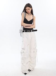 Add a fresh twist to your wardrobe with our white cargo pants. These pants offer both comfort and style, making them a versatile addition to any outfit. Model is 5'5 100lbs wearing S White Cargo Pants Outfit, Cargo Pants Fit, White Cargo Pants, Cargo Pants Outfit, Pants Fit, Pants Outfit, Workout Pants, Cargo Pants, White Background