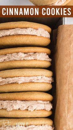 a close up of cookies in a box with the words cinnamon cookies on top and bottom