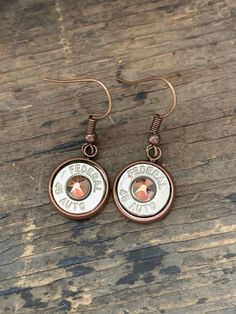 Copper 45 caliber rose gold drop bullet earrings - Jill's Jewels | Unique, Handcrafted, Trendy, And Fun Jewelry 45 Caliber, Bullet Earrings, Rose Gold Color, A Rose, Pocket Watch, Swarovski Crystal, Swarovski Crystals, Gold Color, Copper