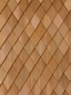 a wooden wall made up of many different shapes and sizes, including the diagonals