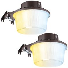 two lights that are next to each other on a white background and one is yellow