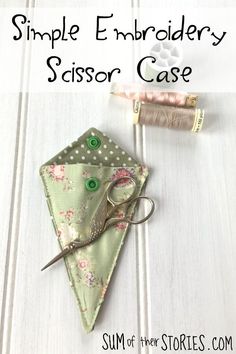 a sewing needle and scissors on top of a piece of fabric with the words simple embroidery scissors case