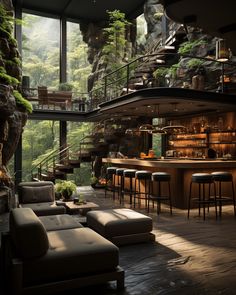 a living room filled with furniture next to a stone wall covered in green plants and trees