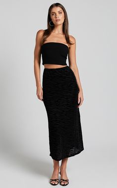 Get ready to make a statement on the dance floor with our Frankie Maxi Skirt! This flirty black A-line skirt is perfect for parties and events where you want to turn heads. Made from luxurious velvet, it features a high-waisted bias cut design that accentuates your curves in all the right places. The lightweight nylon fabric drapes beautifully, giving you an effortlessly chic look. Pair it with a crop top or bodysuit for a trendy and playful ensemble. Whether you're hitting the club or attending Black A Line Skirt, Basic Black Dress, Neon Outfits, Bachelorette Dress, Spring Maxi Dress, Navy Bridesmaid Dresses, Spring Capsule Wardrobe, Long Sleeve Knit Dress, On The Dance Floor