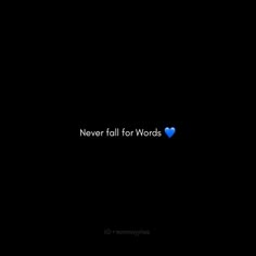 the words never fall for words are shown in blue on a black background with a heart