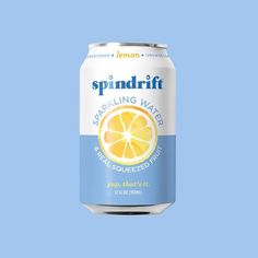 a can of spindrift sparkling water with an orange slice on the side