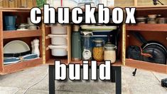 an open cabinet filled with lots of kitchen items and the words chuckbox build above it