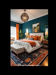 a bedroom with teal walls, orange and white bedding, blue rugs and artwork on the wall