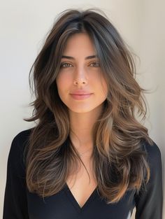 Imagine strands of rich chocolate cascading down in gentle waves, the ends dancing just above the shoulders. This medium length haircut with layers wavy is the epitome of effortless elegance. The layers are cut with precision to enhance the hair’s natural movement, creating a lively bounce with each step. Ideal for those with natural waves, this style is also a perfect canvas for curtain bangs, adding a touch of softness to frame the face. It speaks to the straight hair trending hairstyles of 2024, bringing a cute and dynamic vibe to the classic medium length. Courtney Grow Hair, Soft Layers Medium Hair Round Faces, Quick Curls, Haircuts For Long Hair With Layers, Haircuts For Medium Length Hair, Hair Inspiration Long, Layered Haircuts For Medium Hair, Wavy Haircuts