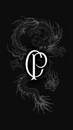 the letter q with a dragon on it