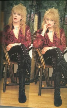 a woman sitting on top of a chair with her legs crossed and wearing black boots