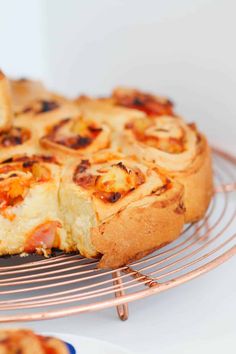 a pizza sitting on top of a metal rack