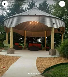 a gazebo sitting in the middle of a park