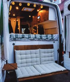 an instagram photo of a couch in the back of a van