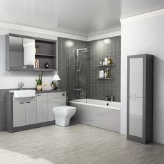 a modern bathroom with gray and white decor, including a toilet, sink, shower, and bathtub