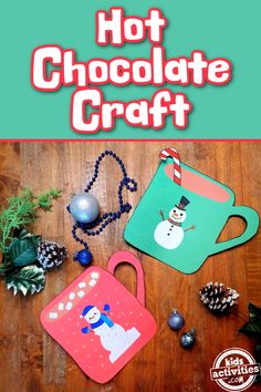 hot chocolate craft is on the table next to pine cones and other holiday decorations with text overlay that reads, hot chocolate craft