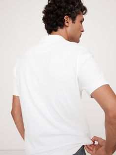 This classic polo is cut from our Luxury-Touch cotton jersey—beloved for its signature softness and a smooth finish that leans more dressed-up in appearance.  Polo collar.  Button placket.  Straight hem with vented sides.  Standard fit.  Short sleeves.  Hits at the hip.  Model: Size M, 6'2" (188cm). Classic White Collared Polo Shirt, Classic Relaxed Fit Polo Shirt With Polo Collar, Classic Relaxed Fit Polo Shirt With Ribbed Collar, Classic Relaxed Fit Polo Shirt, Classic Fitted Polo Shirt With Ribbed Collar, Classic Relaxed Fit Polo Shirt With Seamless Collar, Classic Relaxed Fit Polo Shirt For Work, Classic Fitted Polo Shirt For Workwear, Classic Plain Cotton Polo Shirt