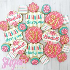 decorated cookies are arranged in the shape of numbers