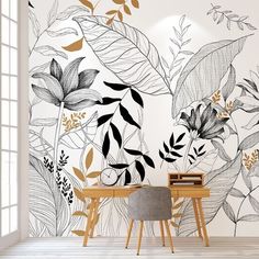 the wallpaper is decorated with black and white leaves