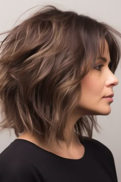 The tousled medium-length shag cut is perfect if you want to achieve an edgy and contemporary look. The layered cuts provide texture and volume making it ideal for those with hair. Click here to check out more flattering medium-length haircuts for women over 40. Haircuts For Women Over 40, Shaggy Bob, Layered Haircuts For Medium Hair, Choppy Bob, Shoulder Length Hair Cuts, Hair 2024, Haircuts For Medium Hair, Medium Hair Cuts, Haircuts For Women