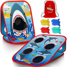 two children's lunch bags with shark design and various items in front of them