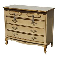 an antique chest of drawers with brass handles