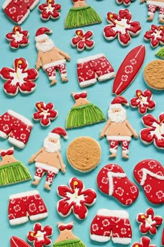 decorated christmas cookies on a blue surface