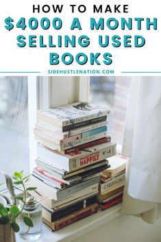 a stack of books sitting on top of a window sill next to a plant