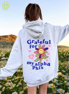 Soft, cute, and trendy, this Alpha Phi hoodie will quickly become your go-to cozy sweatshirt! Use the drop down to specify preference between white, ash, gold, irish green, light blue, carolina blue, or light pink. LISTING IS FOR ALPHA PHI. Please be sure you are ordering for your correct Sorority.  We print on high quality, soft, & heavyweight materials, sustainably made and printed in the US. ♥ SIZING ♥ Unisex Sizing- For a more feminine, fitted look we recommend getting your size. For a more oversized look, we recommend sizing up. ♥ SHIP TIME ♥ Items may take up to 7 business days to process before shipping. Shipping time is (on average) an ADDITIONAL 2-5 business days. Shipping times vary for many reasons, but is largely influenced by your location. ♥ CARE INSTRUCTIONS ♥ Wash garments Spring Sorority Sweatshirt With Letter Print, Sorority Style Letter Print Sweatshirt For Spring, Sorority Style Spring Sweatshirt With Letter Print, Sorority Letter Print Sweatshirt For Spring, Alpha Epsilon Phi, Big Gift, Sorority Sweatshirts, Phi Sigma Sigma, Alpha Sigma Tau