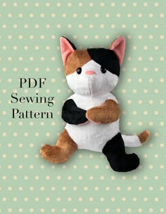 a stuffed cat sitting on top of a polka dot background with the text pdf sewing pattern