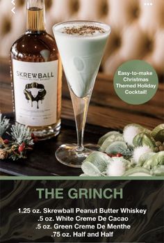 a poster for the grinch cocktail with a bottle of booze next to it