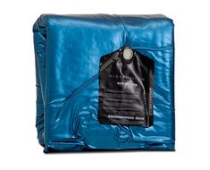 a blue bag with a tag on it