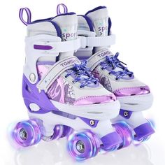 two roller skates with purple and white wheels