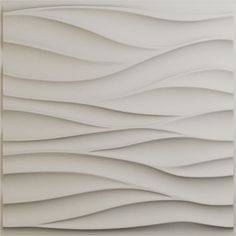 a white wall with wavy lines on it