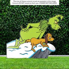 a cartoon character is riding on top of a dog in front of a green hedge