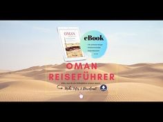 the book oman reiefuhrer is on display in front of a desert landscape