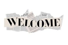 the word welcome cut out of newspaper paper