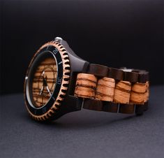 This stylish wooden watch is made of Reclaimed zebra wood. The wood color makes it simple and easy to match with all your outfits. Unique gift ideas for men, boyfriend, husband, Father, Groomsmen. It comes with Nice Watch Box. Product Dimensions: Product Specifications JS25 MOVEMENT - The Japanese Miyota Quartz Movement is renowned for its precise and accurate time. Not a second lags behind even if you continuously use the watch for 5 years. In addition, it complies with the RoHS Directive and features mercury-free batteries. Limited Edition-Each timepiece is unique since no 2 pieces of wood are exactly the same Water Resistant ( Please do not wear when showering & swimming) Comes with watch Case [Gift Box] ATTENTION: Please remember that since every watch is handmade by wood, no one will Nice Watch, Groomsmen Bowtie, Engraved Handwriting, Wooden Watches For Men, Wooden Watches, Outfits Unique, For Him Gifts, Him Gifts, Mens Anniversary Gifts