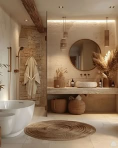 a bathroom with a large round mirror next to a bathtub and sink in front of a brick wall