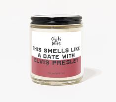 this smells like a date with elvis presley scented candle in a glass jar