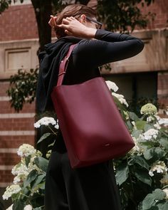 An elevated take on the workbag, meticulously crafted from our signature luxurious Italian leather. Featuring integrated organizational compartments to neatly store your laptop (up to 16”), notebooks, cardigan, and make-up bag. With the Oversized Linea, you’re guaranteed to stand out in a sea of workbags on your morning commutes. Modern Burgundy Shoulder Bag For Office, Rectangular Burgundy Work Bags, Burgundy Rectangular Bag For Work, Burgundy Rectangular Bags For Work, Rectangular Burgundy Bags For Work, Luxury Burgundy Bags For Work, Elegant Shoulder Bag With Interior Card Slots For Work, Burgundy Tote Bag For Work, Modern Burgundy Shoulder Bag For Everyday