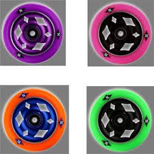 four different colored wheels are shown in this image