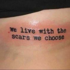 a woman's stomach with the words we live with the scars me choose written on it