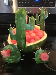 a watermelon carved into the shape of a cactus