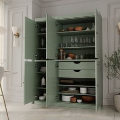 an open cabinet in the middle of a room