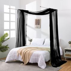 PRICES MAY VARY. Premium quality fabric : Our premium sheer scarfs are made from high thread voile polyester, making them strong, long-lasting, and less likely to rip or tear. Bed canopy scarf curtain Includes 1 long length 52" x 216" voile valance scarf. Perfect Decoration : Our sheer fabric window scarves can be used to top a window, make a bed canopy, decorate a child's room, kids canopy, or even for mosquito protection. Multifunction : Scarves can be used for wedding backdrop, baby shower ba Cozy Black Bedroom Canopy Bed, Velvet Curtain Canopy Bed, Bed Angled In Corner Of Room With Drapes, Canopy Bed Curtains Adult, Black And White Bedroom Canopy Bed, Curtain Hiding Bed, Blackout Curtains Canopy Bed, Black Canopy Bed White Bedding, Canopy Bed For Guys