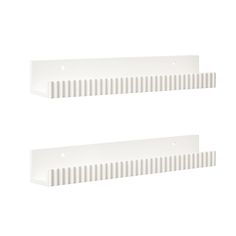 two white shelf brackets on a white wall